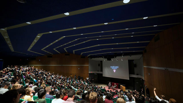 Microsoft co-founder Bill Gates (right) and SEAS Dean Frank Doyle packed the Science Center. Students asked questions following their discussion. Stephanie Mitchell/Harvard Staff Photographer