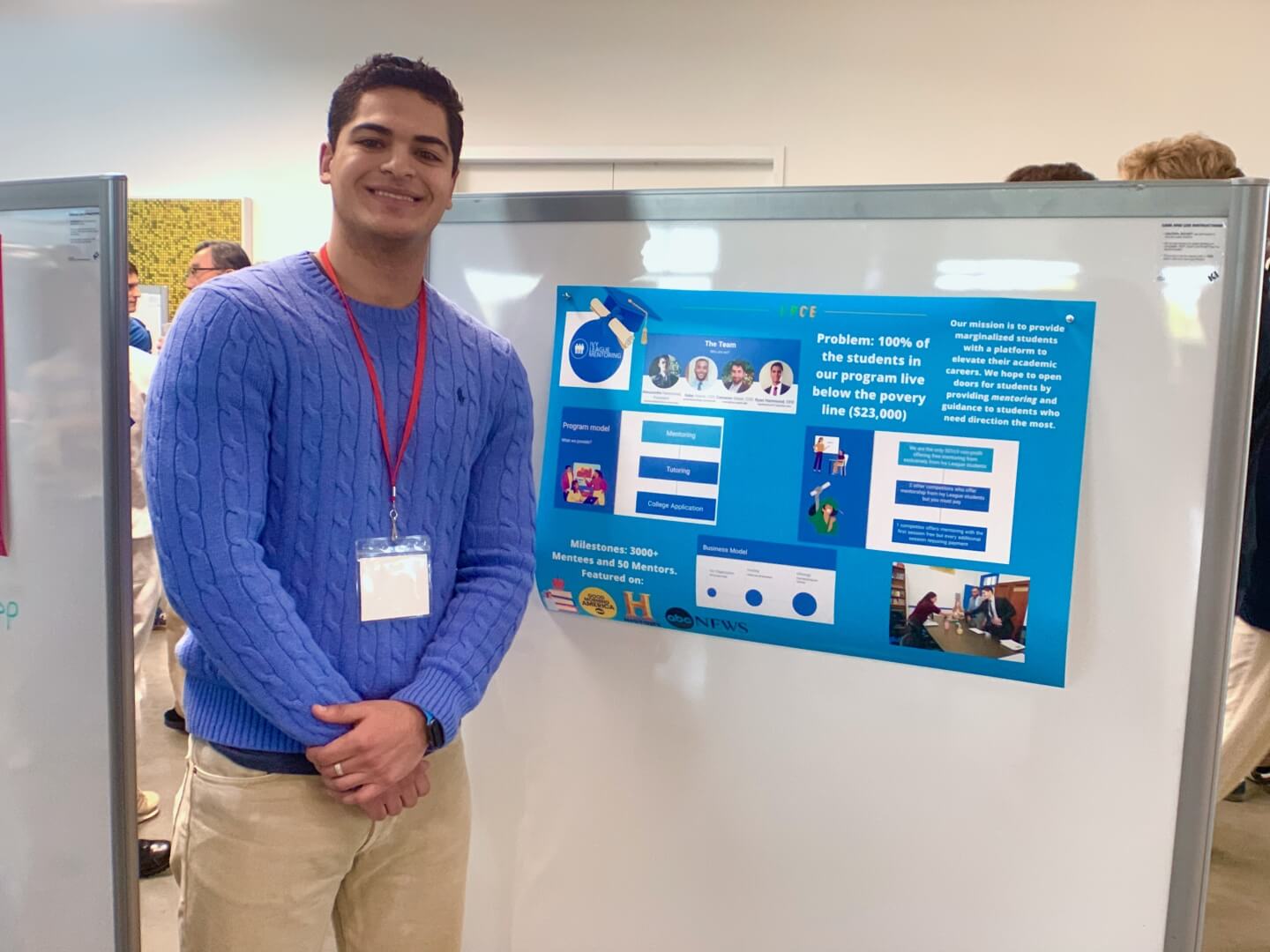 Alessandro Hammond with a poster for the “Ivy League Mentoring” start-up 