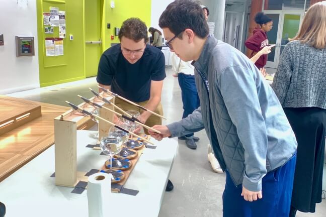 Michael Pak and Zev Nicolai-Scanio with their automated Glass Harmonica