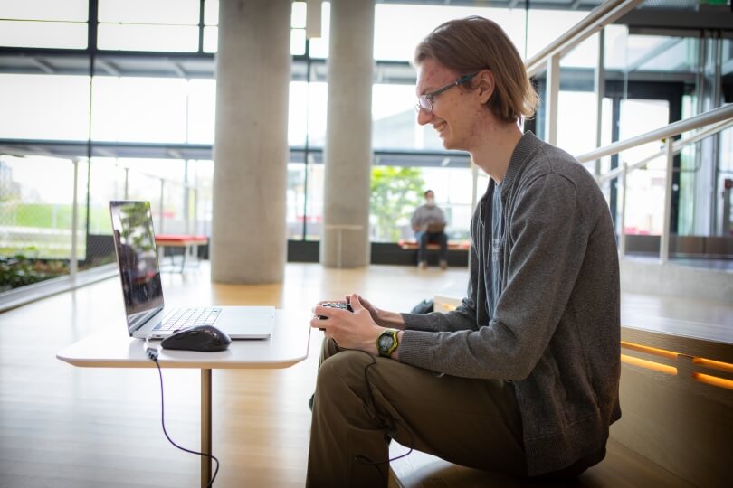 Alex Bimm playing a computer game