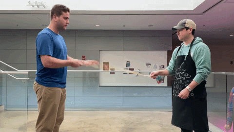 Evan Casalino and James Mooney participate in the longest noodle competition