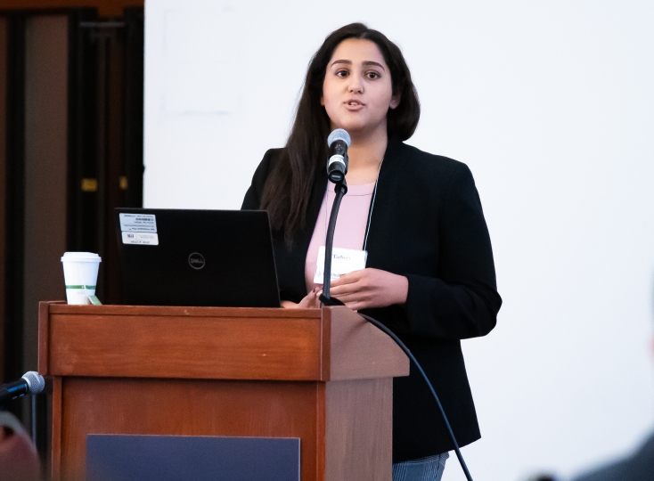 Tatheer Adnan speaking at a conference