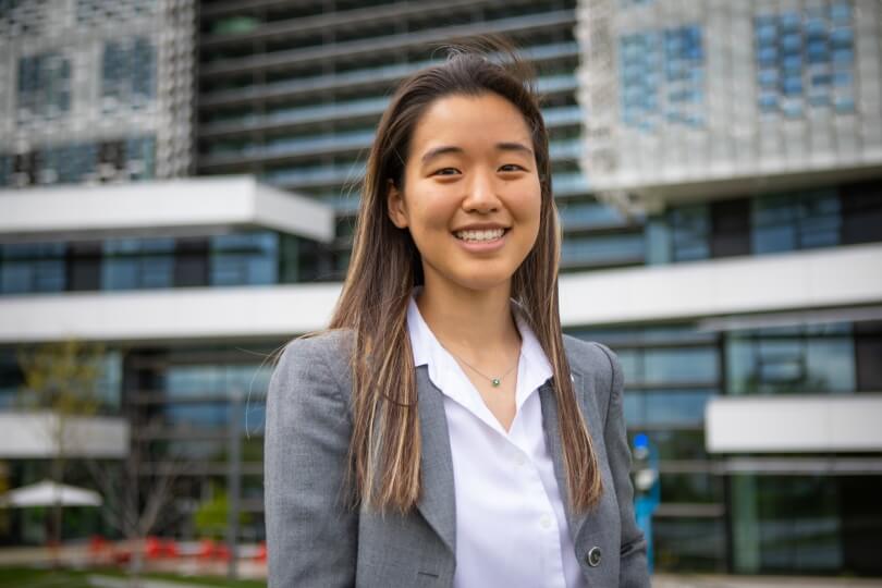 Headshot of Grace Kim in front of the Science and Engineering Complex